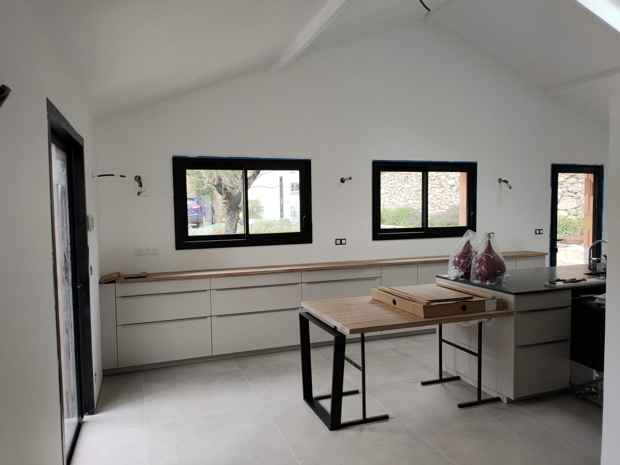 Extension villa dans centre ville, continuité architecturale avec l'existant.